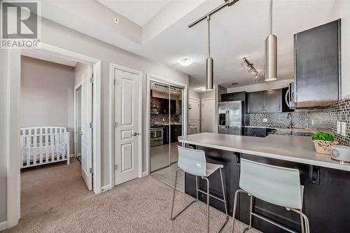 306, 1320 1 Street Se, Calgary, AB - Indoor Photo Showing Kitchen With Upgraded Kitchen