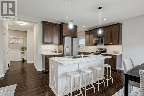 18 Chaparral Valley Place Se, Calgary, AB - Indoor Photo Showing Kitchen With Stainless Steel Kitchen With Double Sink With Upgraded Kitchen