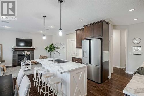 18 Chaparral Valley Place Se, Calgary, AB - Indoor Photo Showing Kitchen With Stainless Steel Kitchen With Double Sink With Upgraded Kitchen