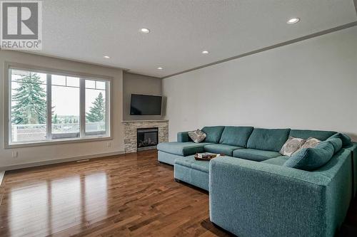 3830 Centre A Street Ne, Calgary, AB - Indoor Photo Showing Living Room With Fireplace