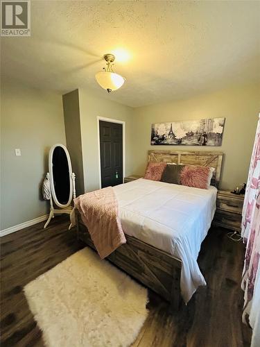 195 Main Street, Point Leamington, NL - Indoor Photo Showing Bedroom