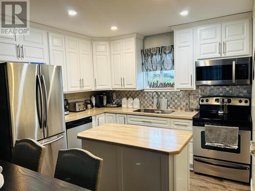 195 Main Street, Point Leamington, NL - Indoor Photo Showing Kitchen With Double Sink