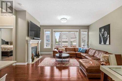 318 Mahogany Manor Se, Calgary, AB - Indoor Photo Showing Living Room With Fireplace