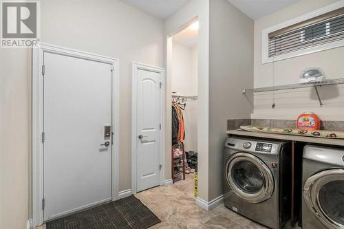 318 Mahogany Manor Se, Calgary, AB - Indoor Photo Showing Laundry Room