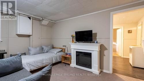 27 Duchess Avenue, London, ON - Indoor Photo Showing Bedroom With Fireplace