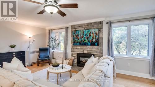 27 Duchess Avenue, London, ON - Indoor Photo Showing Living Room With Fireplace