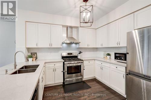 27 - 5992 Turney Drive, Mississauga, ON - Indoor Photo Showing Kitchen With Stainless Steel Kitchen With Double Sink With Upgraded Kitchen