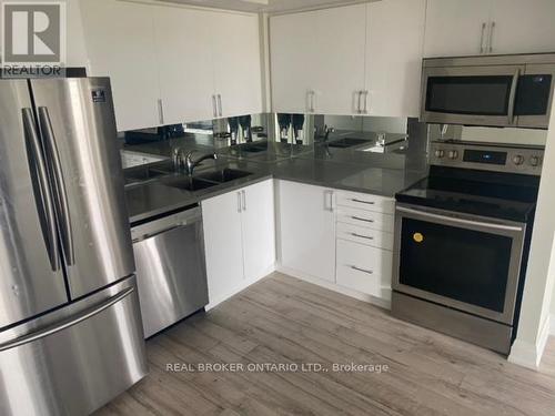 501 - 1040 The Queensway, Toronto, ON - Indoor Photo Showing Kitchen With Stainless Steel Kitchen With Double Sink With Upgraded Kitchen