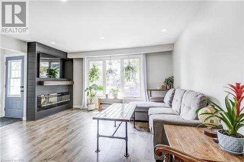 Clean and Bright - 8057 Aintree Drive, Niagara Falls, ON - Indoor Photo Showing Living Room With Fireplace