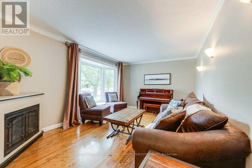 26 Hopecrest Crescent, Toronto (Kennedy Park), ON - Indoor Photo Showing Living Room With Fireplace