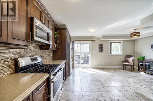 6098 Rowers Crescent, Mississauga, ON - Indoor Photo Showing Kitchen With Upgraded Kitchen