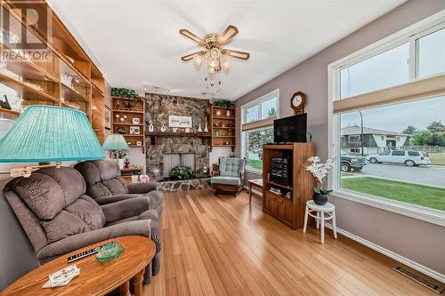 16 Cameron Crescent, Red Deer, AB - Indoor Photo Showing Living Room With Fireplace