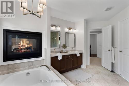 28 Coach Crescent, Whitby (Taunton North), ON - Indoor Photo Showing Bathroom With Fireplace