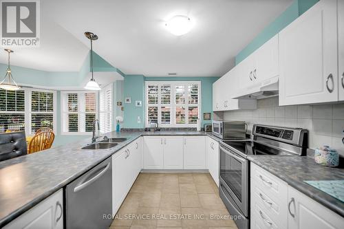 104 - 145 Third Street, Cobourg, ON - Indoor Photo Showing Kitchen With Double Sink