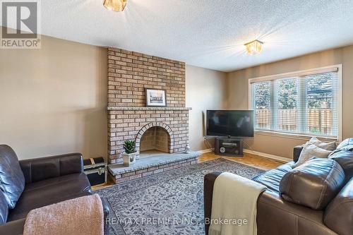 2 Ballycastle Crescent, Brampton, ON - Indoor Photo Showing Living Room With Fireplace