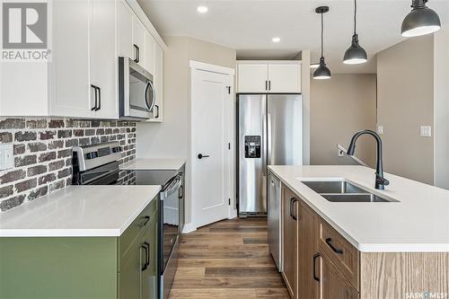 2945 Green Stone Road, Regina, SK - Indoor Photo Showing Kitchen With Double Sink With Upgraded Kitchen