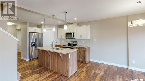 2945 Green Stone Road, Regina, SK - Indoor Photo Showing Kitchen With Double Sink