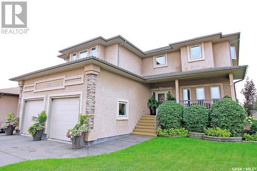 59 Poplar Bay, Yorkton, SK - Outdoor With Deck Patio Veranda With Facade