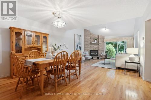 14 - 5 Heritage Way, Kawartha Lakes (Lindsay), ON - Indoor Photo Showing Other Room With Fireplace