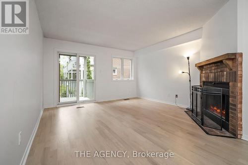 4A Shank Street, Toronto (Niagara), ON - Indoor Photo Showing Living Room With Fireplace