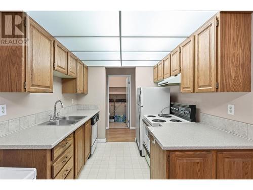 2085 Gordon Drive Unit# 303, Kelowna, BC - Indoor Photo Showing Kitchen With Double Sink