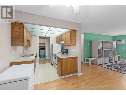 2085 Gordon Drive Unit# 303, Kelowna, BC - Indoor Photo Showing Kitchen With Double Sink