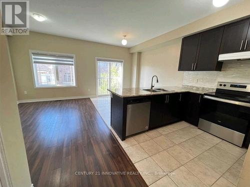 4 Waterstone Way, Whitby, ON - Indoor Photo Showing Kitchen With Double Sink