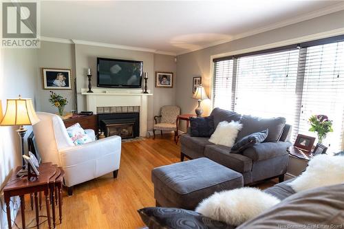 14 Crescent Drive, Rothesay, NB - Indoor Photo Showing Living Room With Fireplace