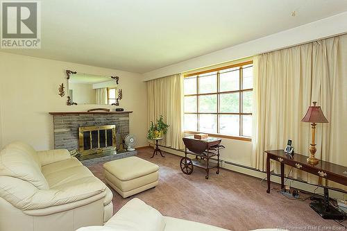 24 Ian Street, Saint John, NB - Indoor Photo Showing Living Room With Fireplace