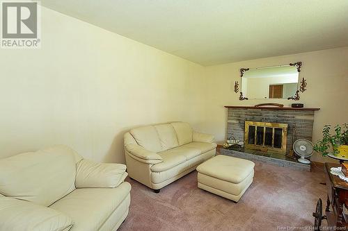 24 Ian Street, Saint John, NB - Indoor Photo Showing Living Room With Fireplace