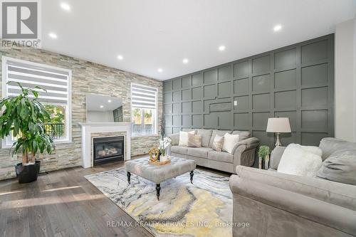 18 Tideland Drive, Brampton, ON - Indoor Photo Showing Living Room With Fireplace