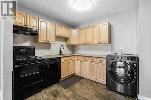 404 522 X Avenue S, Saskatoon, SK - Indoor Photo Showing Laundry Room