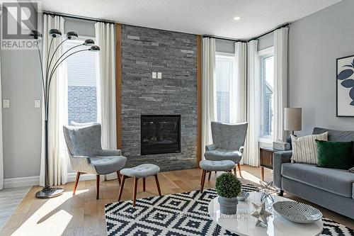 1255 Emma Chase Drive, London, ON - Indoor Photo Showing Living Room With Fireplace