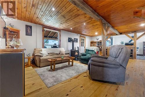 Living room with wood stove. - 5258 Murphy Road, Calabogie, ON - Indoor Photo Showing Other Room