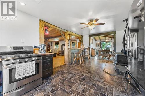 Wood beams tie in the home's character. - 5258 Murphy Road, Calabogie, ON - Indoor