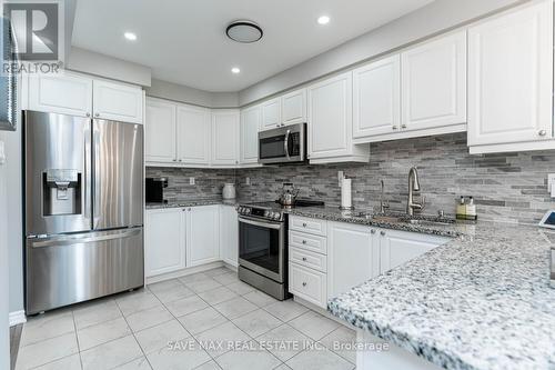 212 Waterbrook Lane, Kitchener, ON - Indoor Photo Showing Kitchen With Upgraded Kitchen