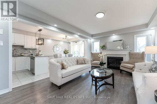 212 Waterbrook Lane, Kitchener, ON - Indoor Photo Showing Living Room With Fireplace