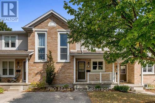 89 - 240 London Road W, Guelph, ON - Outdoor With Deck Patio Veranda With Facade