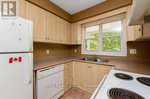 89 - 240 London Road W, Guelph, ON - Indoor Photo Showing Kitchen With Double Sink