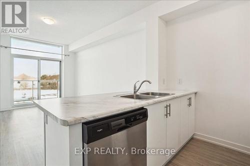 308 - 450 Dundas Street E, Hamilton (Waterdown), ON - Indoor Photo Showing Kitchen With Double Sink