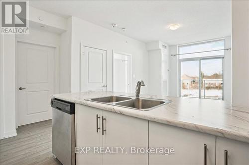 308 - 450 Dundas Street E, Hamilton (Waterdown), ON - Indoor Photo Showing Kitchen With Double Sink