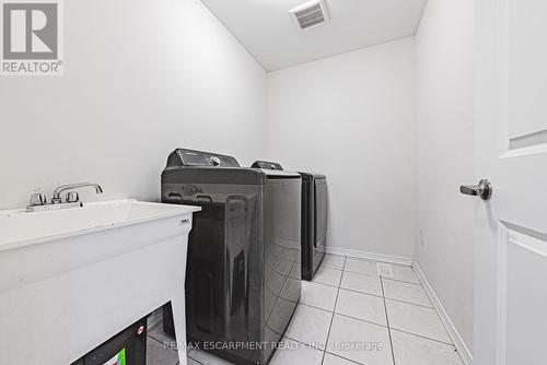 11 Mcwatters Street, Hamilton, ON - Indoor Photo Showing Laundry Room