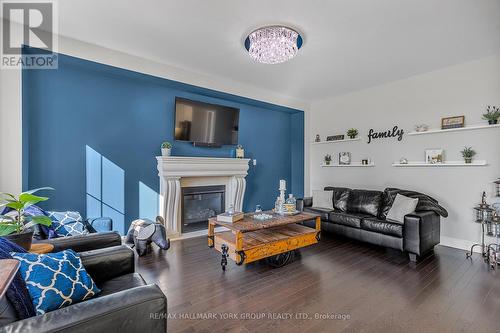 87 Manor Hampton Street, East Gwillimbury, ON - Indoor Photo Showing Living Room With Fireplace