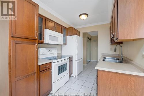 150 Park Street West Unit# 1516, Windsor, ON - Indoor Photo Showing Kitchen With Double Sink