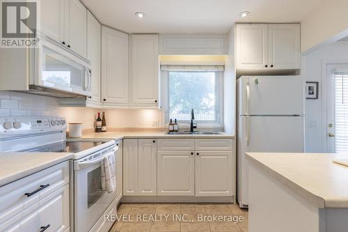 22 Tamarack Avenue, St. Catharines, ON - Indoor Photo Showing Kitchen With Double Sink