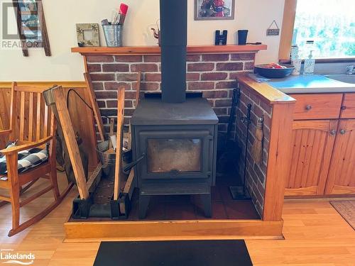 1023 Twilight Close W, Dorset, ON - Indoor Photo Showing Other Room With Fireplace