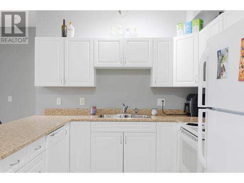 770 Rutland Road N Unit# 307, Kelowna, BC - Indoor Photo Showing Kitchen With Double Sink