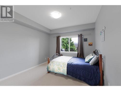 770 Rutland Road N Unit# 307, Kelowna, BC - Indoor Photo Showing Bedroom