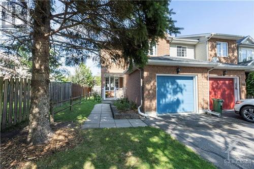 This end unit is ideally located on a serene street, just a short walk from parks, schools, shops, and public transit. - 48 Eagleview Street, Ottawa, ON - Outdoor