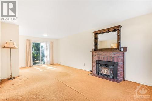 Living Room with fireplace / Dining Room - 2030 Dovercourt Avenue, Ottawa, ON - Indoor Photo Showing Living Room With Fireplace